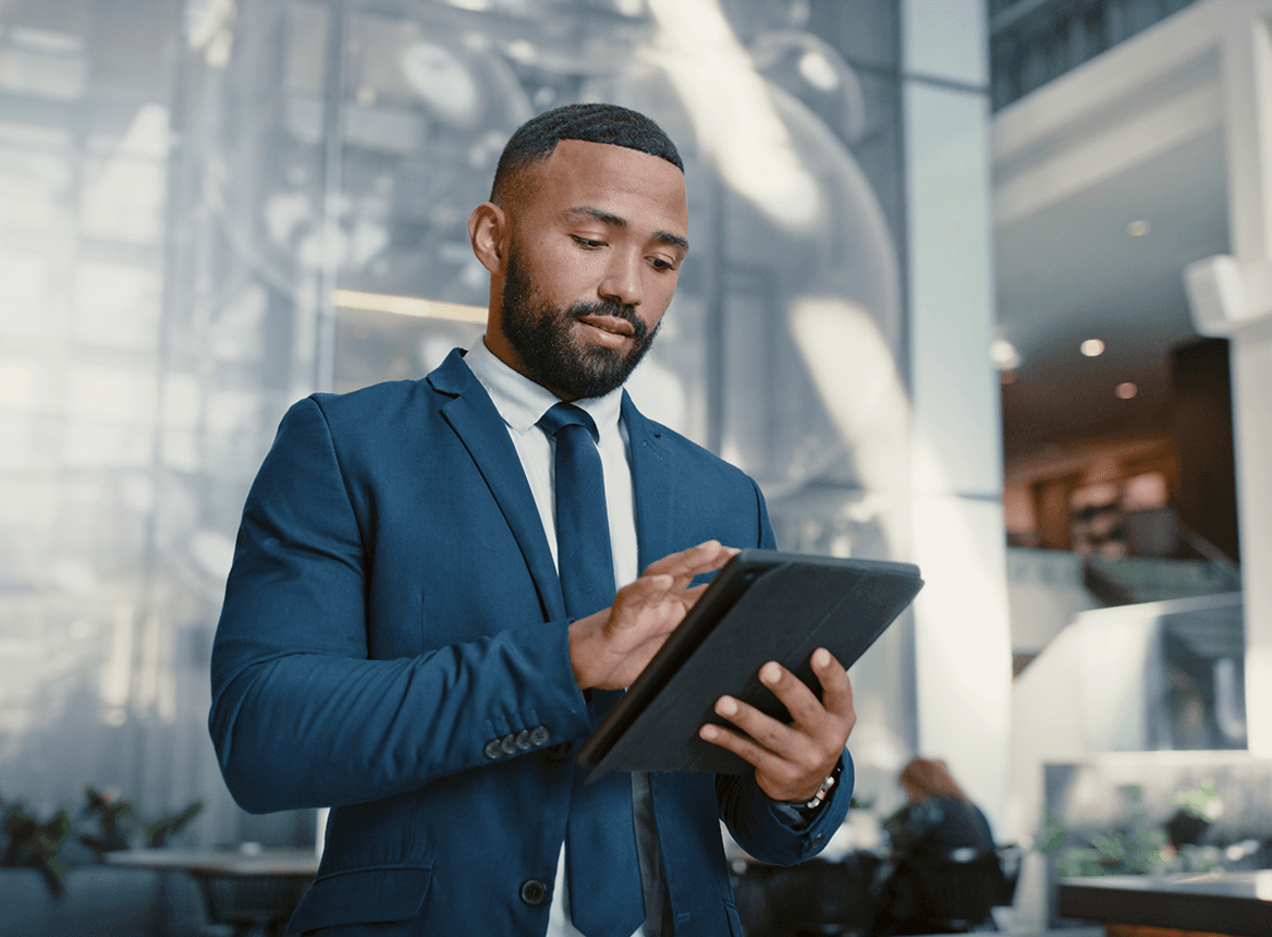 Business Professional Using Tablet in Modern Office