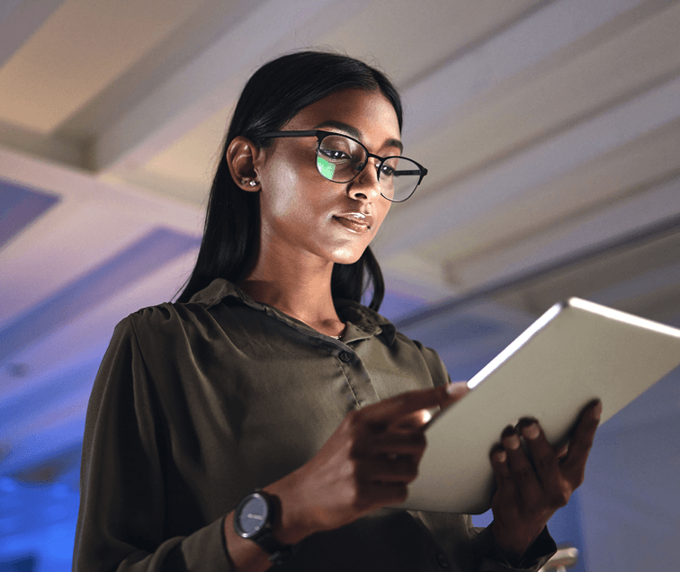 Woman Staring at Tablet